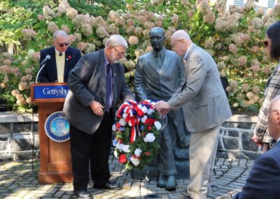 Vice Chairman Dr. Walton Jones and Vice President Tony TenBarge placed the wreath.
