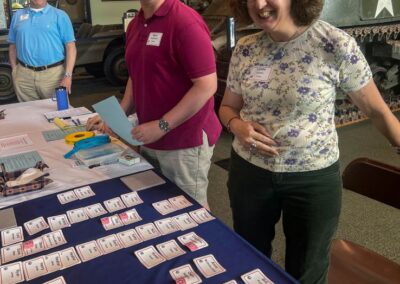 2026 At Ease Event: Bruce, Ryan and Linda helped at registration. Not pictured, Ken and Theresa assisted as well.